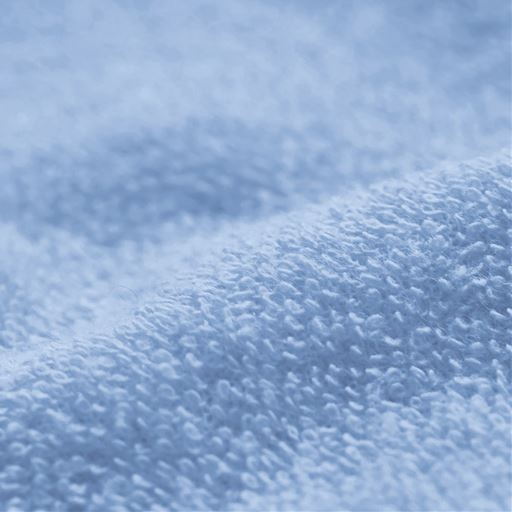 生地拡大 ブルー(北欧柄) 裏面<br>綿パイル生地が汗のベタつきを防いで、一年中気持ちよく。