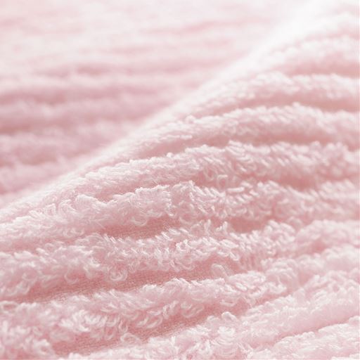 生地拡大(ピンク)<br>綿とキュプラ素材のやさしい感触。