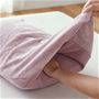 余った部分を折り込んでサイズ調整が可能。