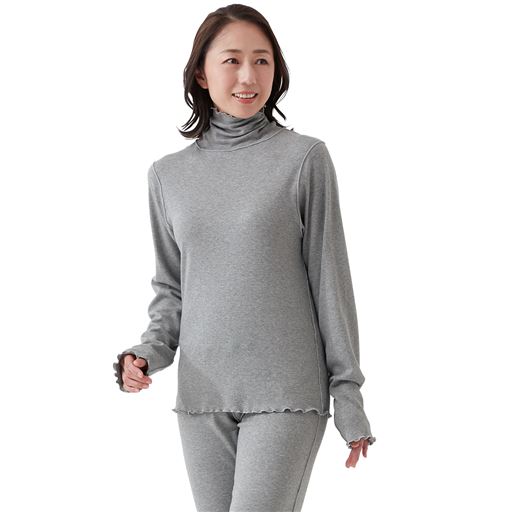 ハイネック&12分袖ですき間をカバー。※着用のパンツはSK-631(別売り)です。 B(杢グレー)