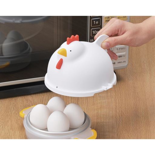(2) 卵をセットしフタをロック。