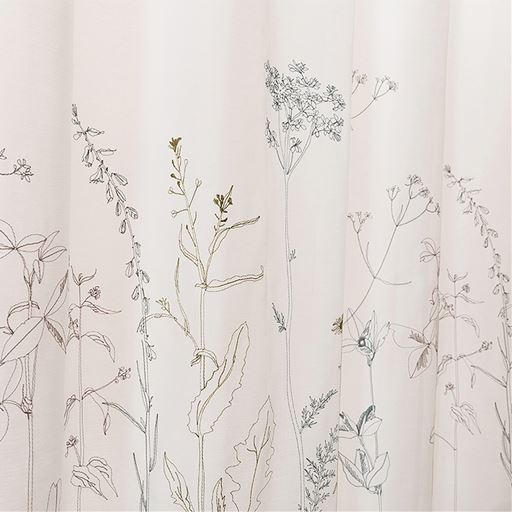 生地拡大(柄部分)<br>落ち着いた深い色合いで色とりどりの草花を表現。