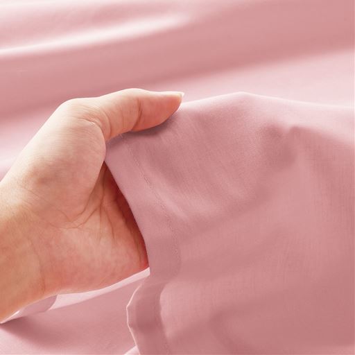 生地拡大(ピンク)<br>ほどよい厚みで一年中お使いいただけます。