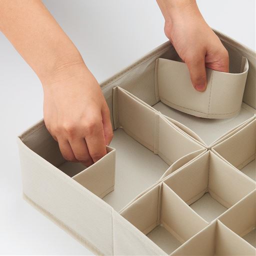 仕切りをパタパタ動かせるので、大きさの違う物もムダなくスッキリ収まります。