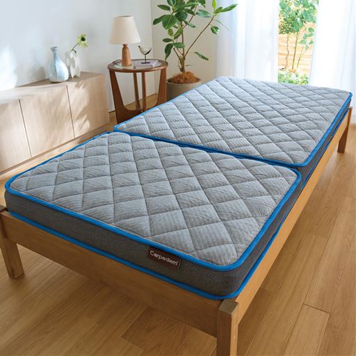 グレー<br>高級ベッドにも使われるポケットコイルと低反発ウレタンを組み合わせることで、体圧分散性とフィット感を高め、腰への負担を軽減します。