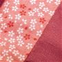 ピンク<br>散りばめられた桜の和柄がアクセント。