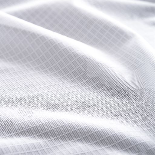 生地拡大(オフホワイト)<br>プリントではなく編み立てて柄を出しています。