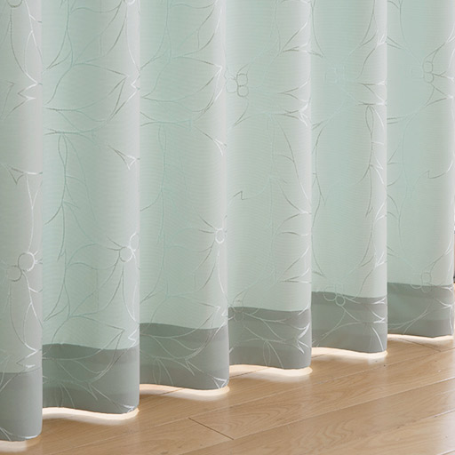 グリーン<br>※裾の縫い代部分は、写真のように外から光に当たると若干暗く見えます。