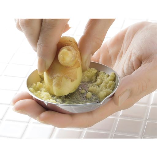 クルクルと円を描くようにおろします