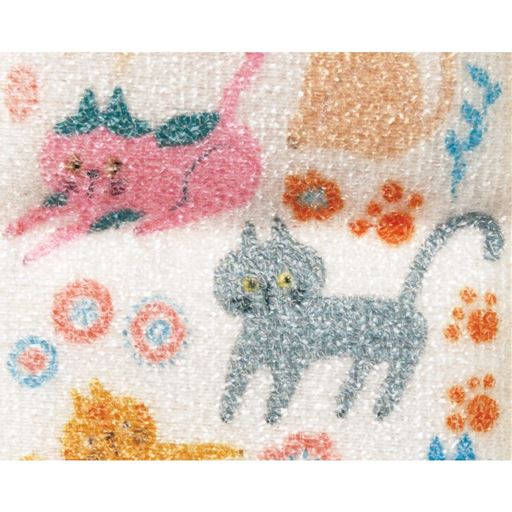 のるニャンズ 表面拡大<br>マイクロファイバーとフィルム繊維の面は、こびりついた頑固な汚れに。