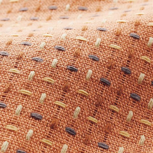 オレンジ<br>多色使いの刺し子調生地です。