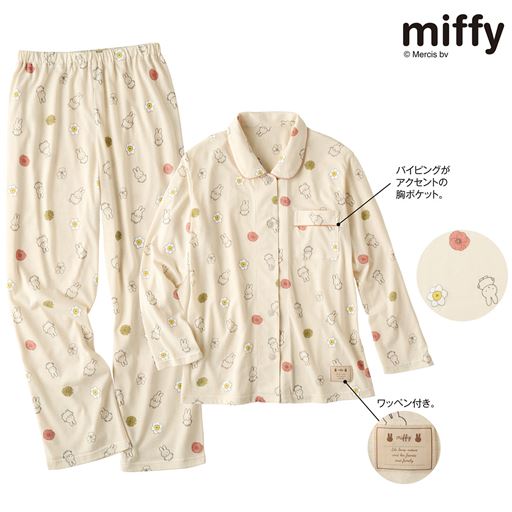 クリームベージュ (1)パイピングがアクセントの胸ポケット。(2)ワッペン付き。