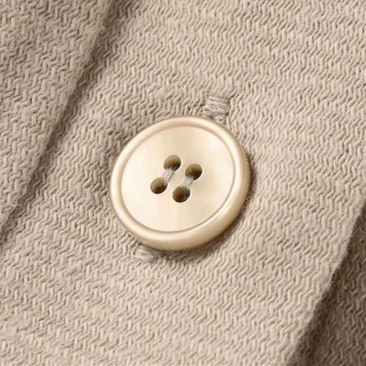 身生地と同系色の貝調ボタン